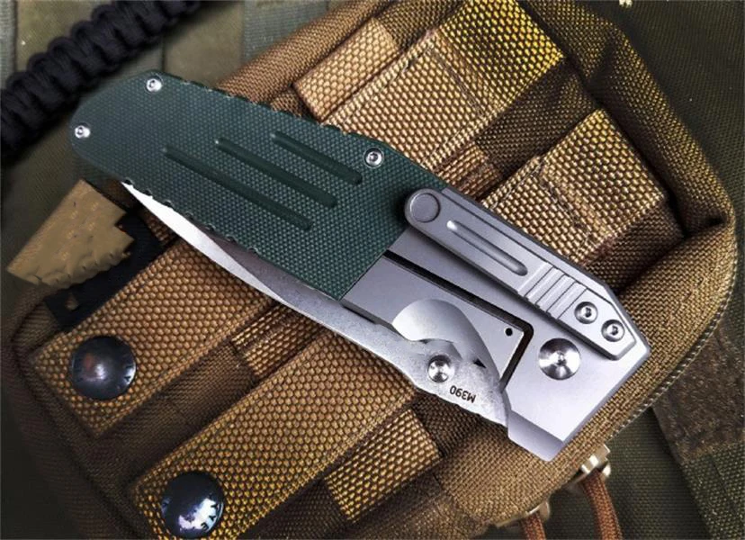 Высококачественный складной нож из титанового сплава с ручкой G10, лезвие M390 Benchmade 7505, безопасные карманные ножи для самообороны, инструмент ...
Высококачественный складной нож из титанового сплава с ручкой G10, лезвие M390 Benchmade 7505, безопасные карманные ножи для самообороны, инструмент ...