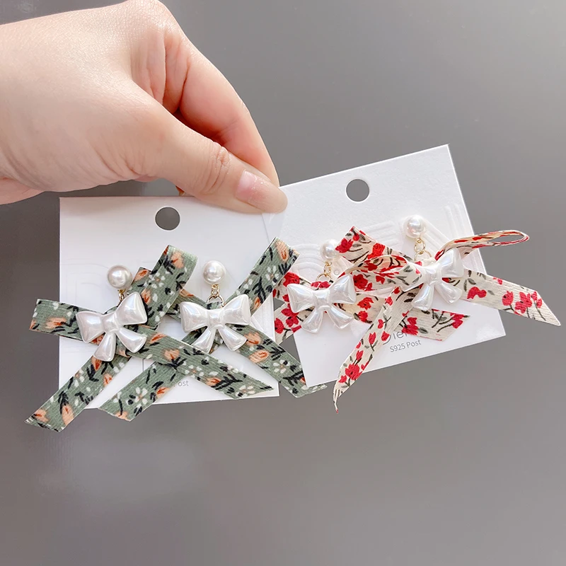 925 Silver Pin Girl Heart Fabric Print Bow Sweet Ins Style Mori Pearl Earrings Korean Fashion Earrings for Women
925 Silver Pin Girl Heart Fabric Print Bow Sweet Ins Style Mori Pearl Earrings Korean Fashion Earrings for Women