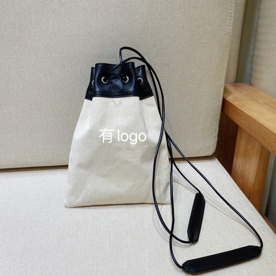 Drawstring Closure Canvas Bag Niche Design Shoulder Bag Fashion Leather Canvas Bucket Bag Women Handbags
Drawstring Closure Canvas Bag Niche Design Shoulder Bag Fashion Leather Canvas Bucket Bag Women Handbags