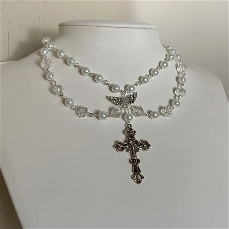 Handmade Sacred Cross Angel's Wing Pearl Chokers Layered Double layer Chain Y2K Imitation White Crystal Beaded Rosary Necklace
Handmade Sacred Cross Angel's Wing Pearl Chokers Layered Double layer Chain Y2K Imitation White Crystal Beaded Rosary Necklace