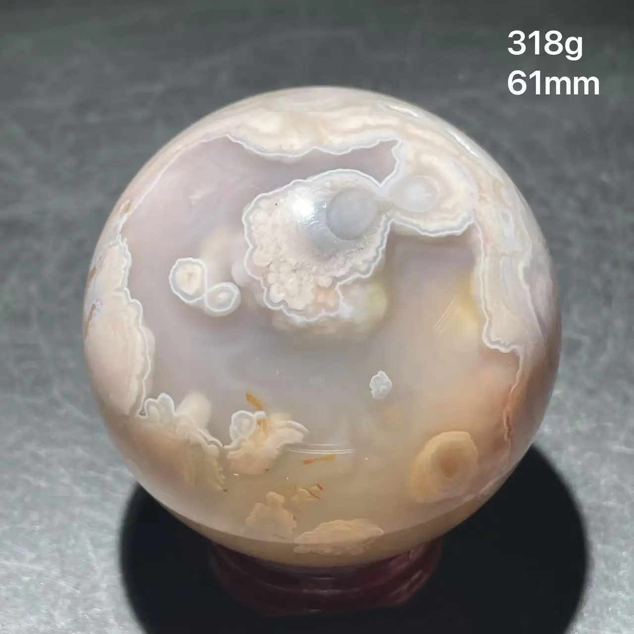 Натуральный агатовый кварцевый шар вишневого цвета
Натуральный агатовый кварцевый шар вишневого цвета