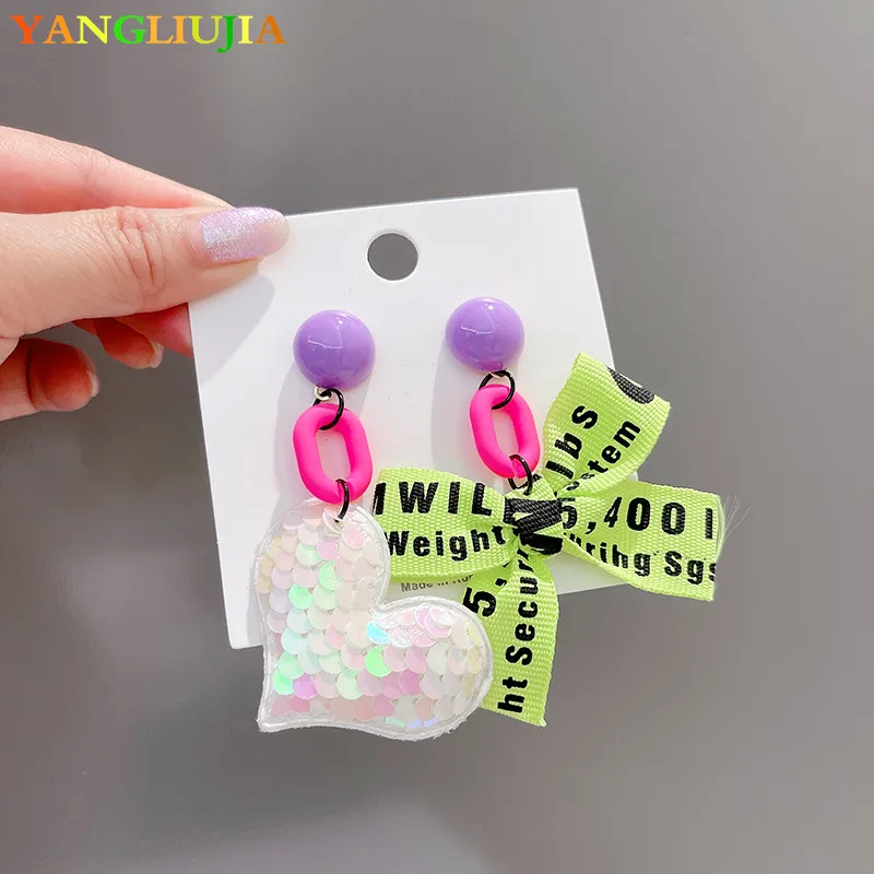 YANGLIUJIA Asymmetric Bowknot Heart-shaped Pendant Earrings Personality Fashion Stud Earrings Ms Girl Travel Accessories 2022
YANGLIUJIA Asymmetric Bowknot Heart-shaped Pendant Earrings Personality Fashion Stud Earrings Ms Girl Travel Accessories 2022