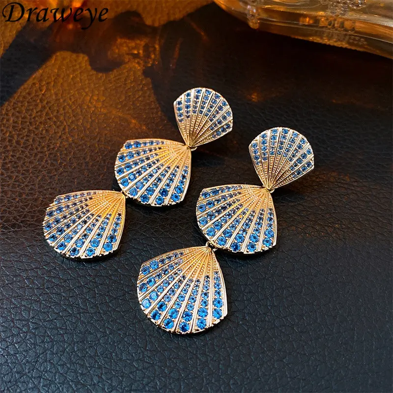 Draweye Earrings for Women Blue Zircon Shell Geometric Vintage Aretes De Mujer Banquet Party Elegant Korean Fashion Jewelry
Draweye Earrings for Women Blue Zircon Shell Geometric Vintage Aretes De Mujer Banquet Party Elegant Korean Fashion Jewelry