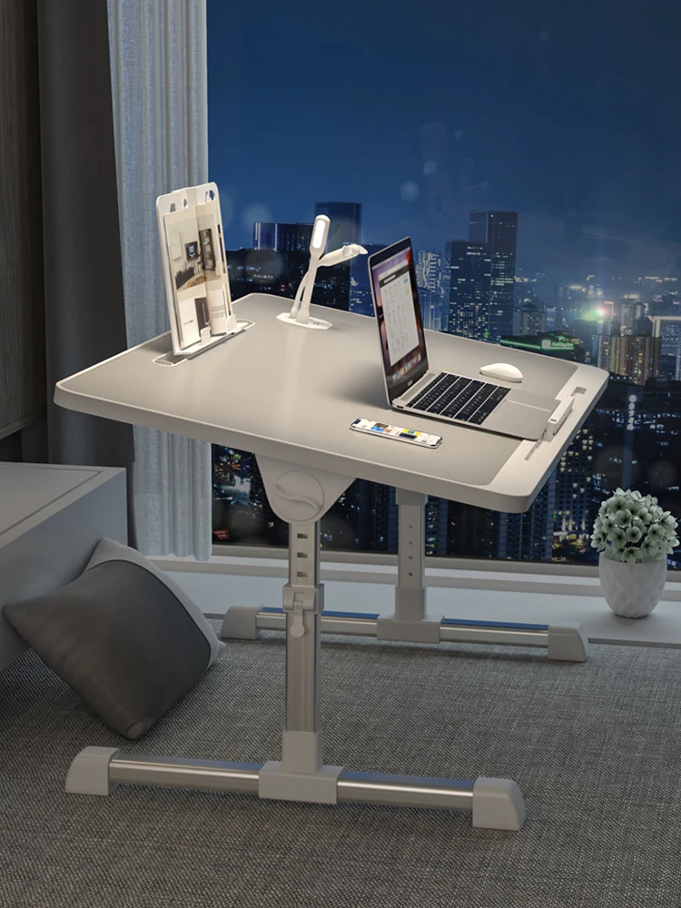 Small table on the bed can be lifted computer table student dormitory folding table simple household simple bedroom study desk
Small table on the bed can be lifted computer table student dormitory folding table simple household simple bedroom study desk
