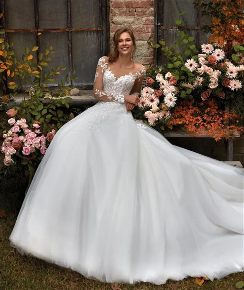Classic Long Sleeve A-Line Wedding Dress Simple Appliques Country Wedding Dresses Illusion Robe de Mariee
Classic Long Sleeve A-Line Wedding Dress Simple Appliques Country Wedding Dresses Illusion Robe de Mariee