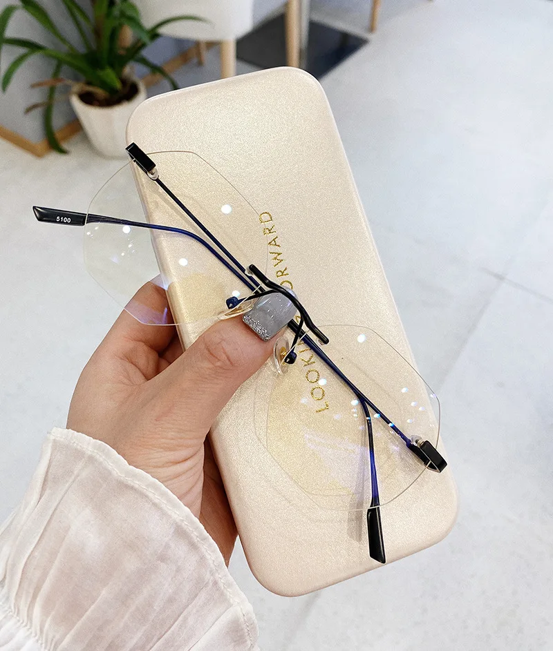 Blue Llight Blocking Rimless Glasses Frame Women Spectacle Myopia Transparent Glasses Men EyeGlasses Optical Frames
Blue Llight Blocking Rimless Glasses Frame Women Spectacle Myopia Transparent Glasses Men EyeGlasses Optical Frames