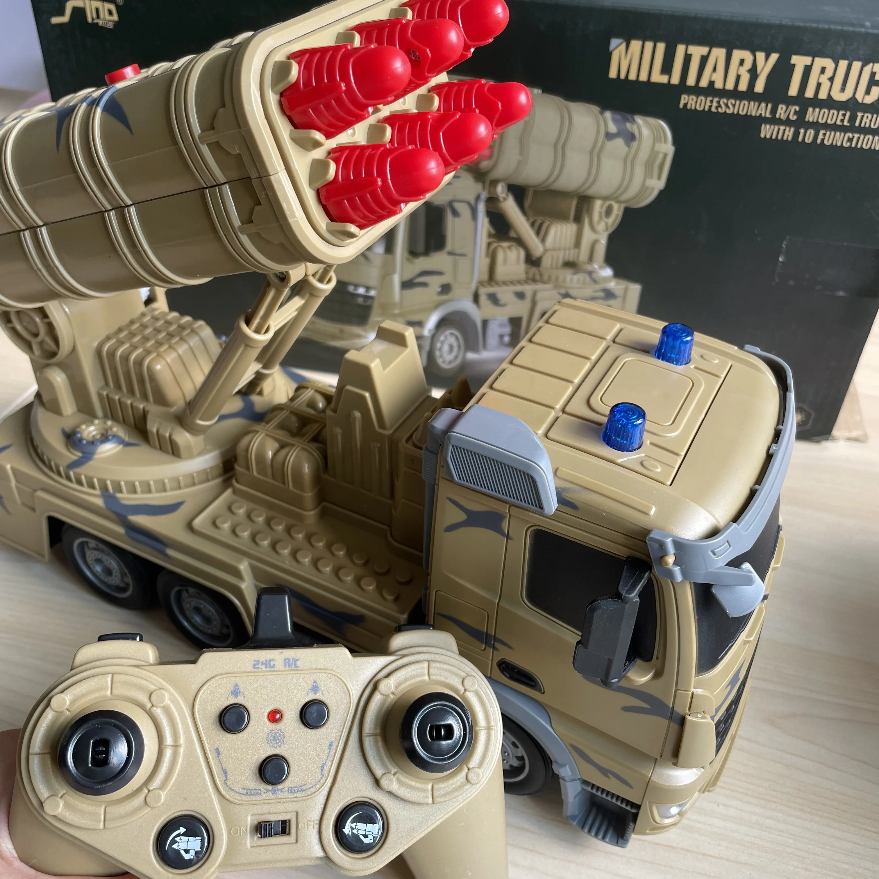 

1/24 2.4G Rc Truck Radio Controlled Car 10 Channel Military Missile Vehicle Model Rocket Launcher with Launch Function Toys Boys