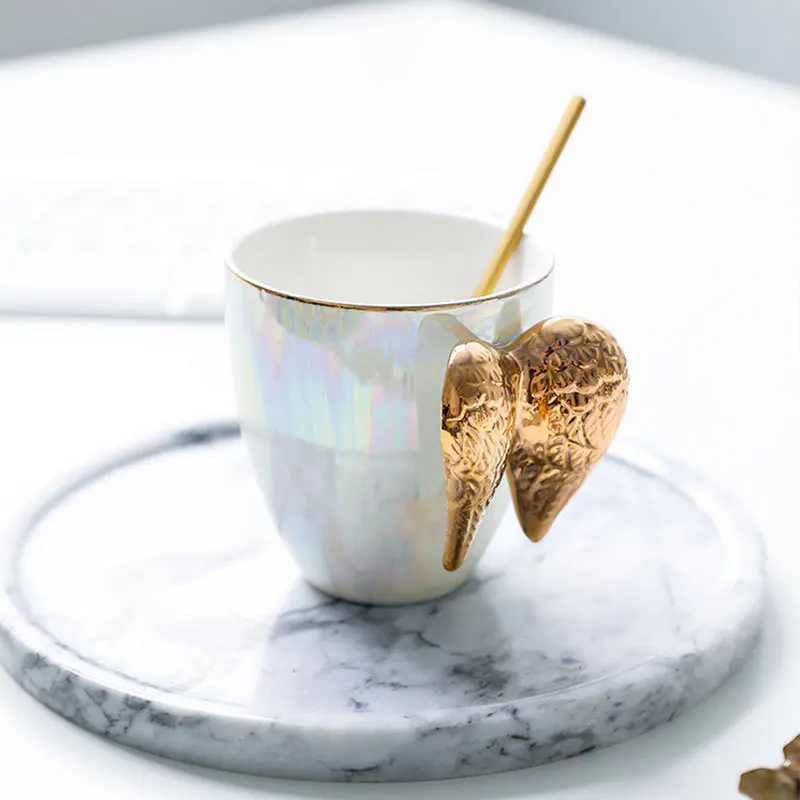 Original Fairy Mug Golden Angel Wings Ceramic Coffee Mugs Pearl Glaze Couples Creative Espresso Milk Tea Water Cup Wedding Gifts
Original Fairy Mug Golden Angel Wings Ceramic Coffee Mugs Pearl Glaze Couples Creative Espresso Milk Tea Water Cup Wedding Gifts