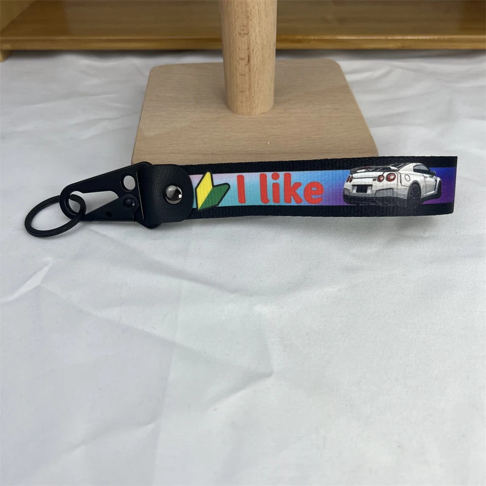 Car Keychain Logo 3D Emblem Fabric Color Gradient Anime Cartoon I Like JDM Key Ring For Nissan GTR R34 R35 Auto Accessories
Car Keychain Logo 3D Emblem Fabric Color Gradient Anime Cartoon I Like JDM Key Ring For Nissan GTR R34 R35 Auto Accessories