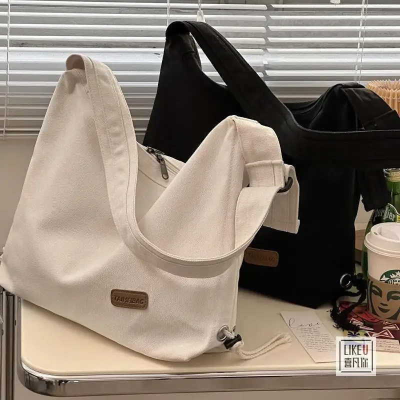 Women's Korean Messenger Bag Large Capacity Shoulder Bag simple Fashion Schoolbag High School Bag Canvas Shoulder Bag
Women's Korean Messenger Bag Large Capacity Shoulder Bag simple Fashion Schoolbag High School Bag Canvas Shoulder Bag