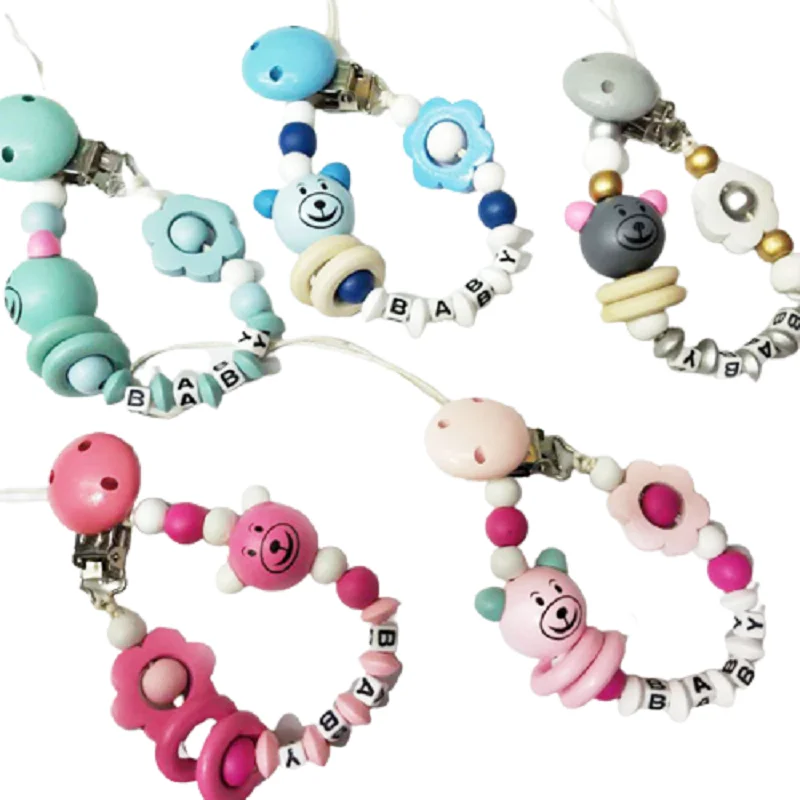 Деревянная цепочка-держатель для соски-пустышки для новорожденных
Деревянная цепочка-держатель для соски-пустышки для новорожденных