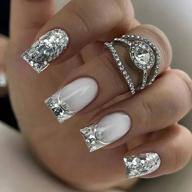 24Pcs Flashing Silver Short Coffin False Nails Art Ballet with French Design Wearable Fake Nails Artificial Press on Nail Tips
24Pcs Flashing Silver Short Coffin False Nails Art Ballet with French Design Wearable Fake Nails Artificial Press on Nail Tips
