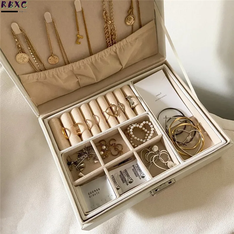 Net Red Jewelry Box Leather Double-layer Flannelette Korean Earrings Necklace Finishing Lattice Portable Jewelry Storage Box
Net Red Jewelry Box Leather Double-layer Flannelette Korean Earrings Necklace Finishing Lattice Portable Jewelry Storage Box