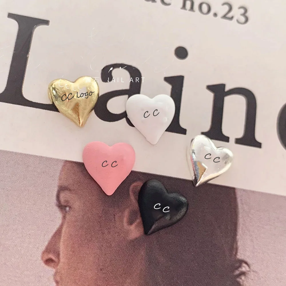 Luxury Brand Logo Nail Art Charms M-I-U CC Chrome-Cross-Heart Alloy Mixed Style Contour Logo Gold Fingertips Ornament 404Nailart
Luxury Brand Logo Nail Art Charms M-I-U CC Chrome-Cross-Heart Alloy Mixed Style Contour Logo Gold Fingertips Ornament 404Nailart