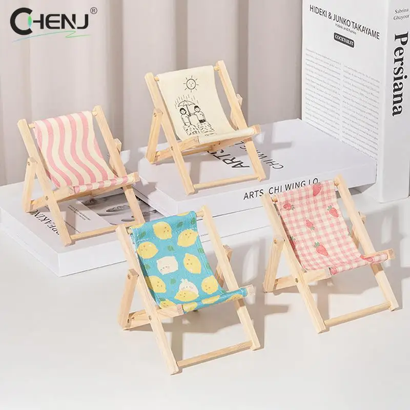 Creative Cute Desktop Mini Beach Chair Stand Can Be Used As Decorative Ornaments Foldable Lazy Drama Mobile Phone Holder
Creative Cute Desktop Mini Beach Chair Stand Can Be Used As Decorative Ornaments Foldable Lazy Drama Mobile Phone Holder