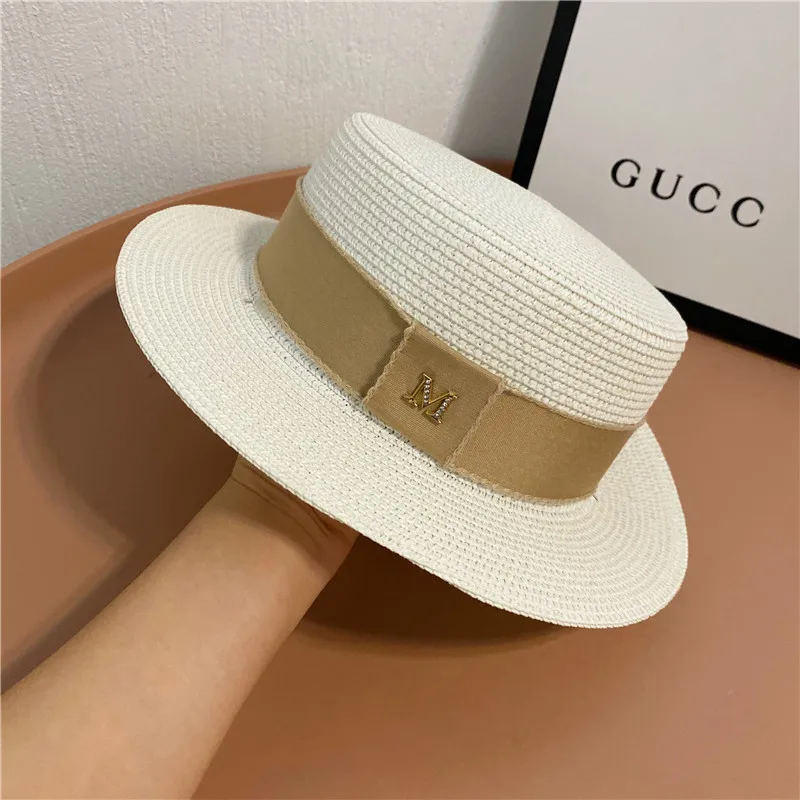 White flat-roofed straw hat in the summer of female fashion wide-brim sunscreen fashionable joker ribbon M standard British sun
White flat-roofed straw hat in the summer of female fashion wide-brim sunscreen fashionable joker ribbon M standard British sun
