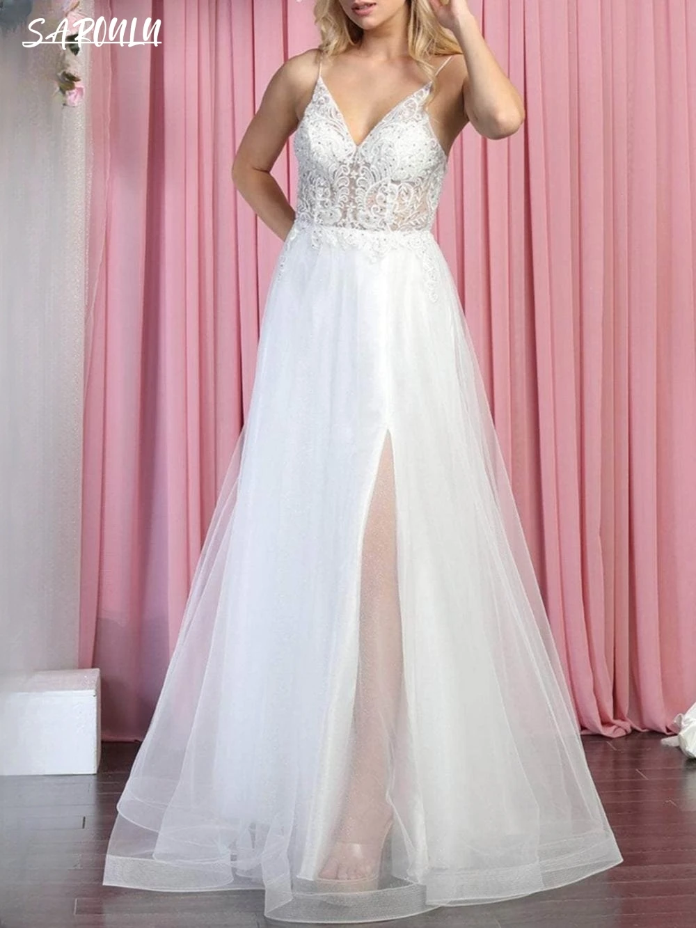 Sleeveless V-neck Wedding Gown Sheer Appliques Bride Dresses High Slit Horsehair Hemline Bridal Gown Robe De Mariée
Sleeveless V-neck Wedding Gown Sheer Appliques Bride Dresses High Slit Horsehair Hemline Bridal Gown Robe De Mariée