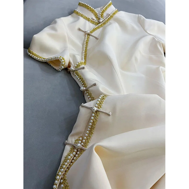Dress Women's Summer Improved Pearl Beading Small Fragrance Temperament Elegant High Sense Design Chic Midi Cheongsam
Dress Women's Summer Improved Pearl Beading Small Fragrance Temperament Elegant High Sense Design Chic Midi Cheongsam