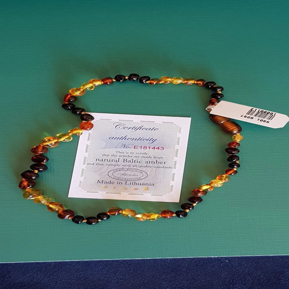 Amber Baby Teeth Necklace Certified 100% Real Stone
Amber Baby Teeth Necklace Certified 100% Real Stone