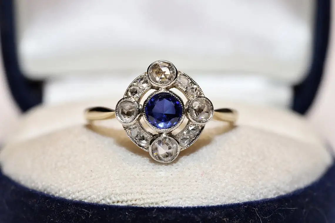 Antique Art Deco Original 14k Gold Natural Rose Cut Diamond And Sapphire Decorated Ring
Antique Art Deco Original 14k Gold Natural Rose Cut Diamond And Sapphire Decorated Ring