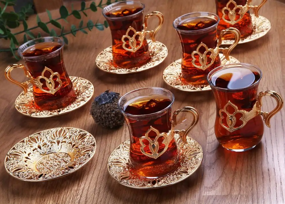 Handmade authentic gold silver anatolian arabic turkish tea cup and supports set türkiye'de made for six people
Handmade authentic gold silver anatolian arabic turkish tea cup and supports set türkiye'de made for six people