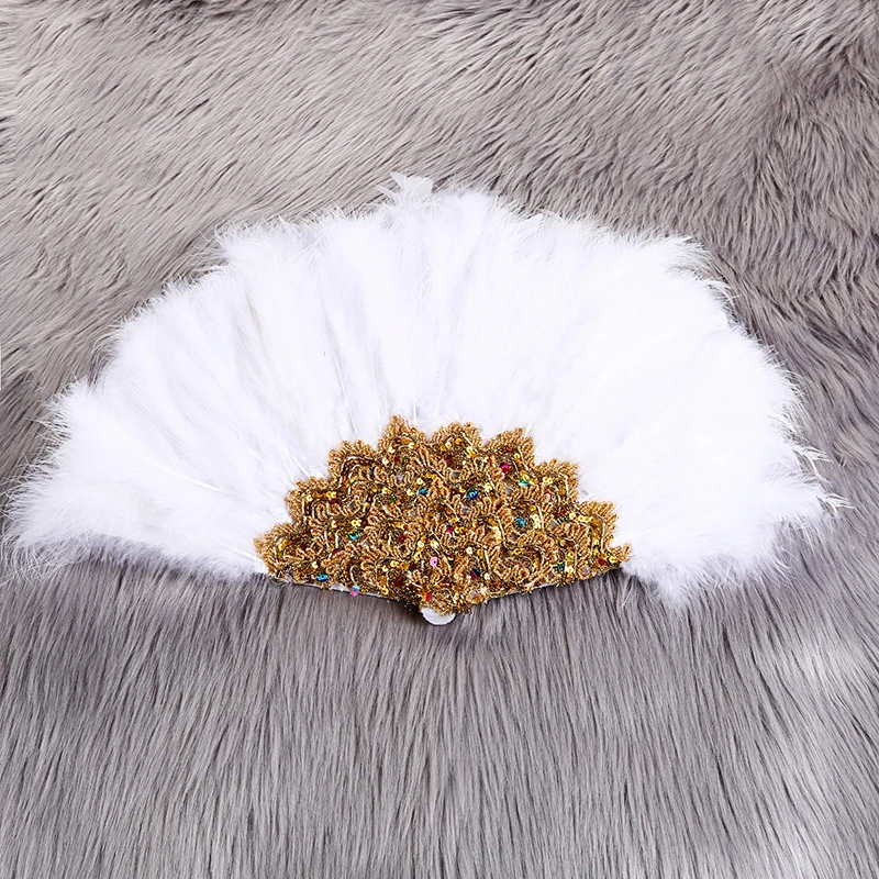 African Turkey Feather Hand Fan One Side Handmade Handfan For Dance Wedding Decoration Fan With Handmade Stones Customized Fan
African Turkey Feather Hand Fan One Side Handmade Handfan For Dance Wedding Decoration Fan With Handmade Stones Customized Fan