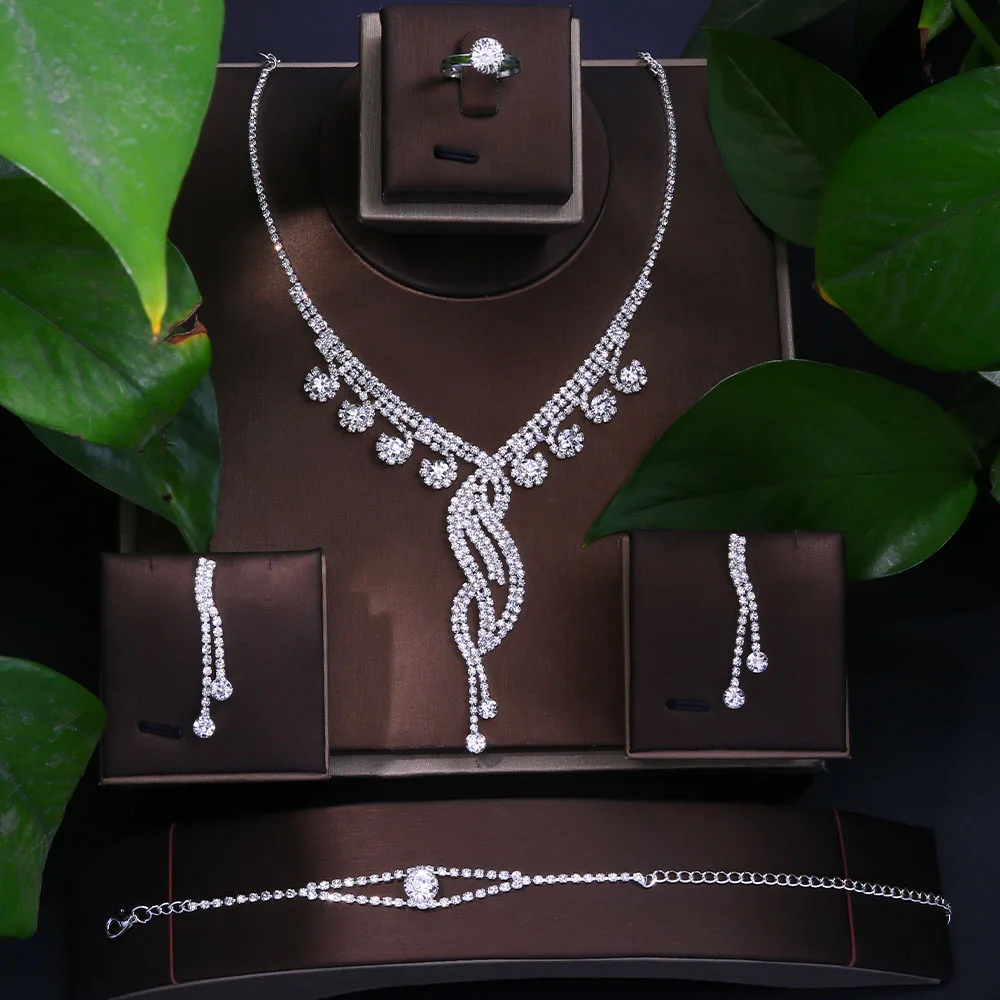 Роскошный свадебный комплект стразы из 4 предметов ожерелье ювелирные изделия для женщин модные свадебные ювелирные наборы кристалл сереб... 
Роскошный свадебный комплект стразы из 4 предметов ожерелье ювелирные изделия для женщин модные свадебные ювелирные наборы кристалл сереб...