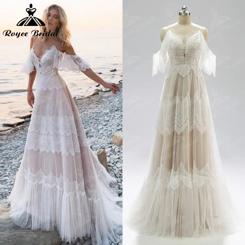 Boho V-neck Spaghetti Straps Lace Up Appliques Lace A-Line Wedding Dress 2022 Tulle Bridal Gown Sweep Floor robes de soirée
Boho V-neck Spaghetti Straps Lace Up Appliques Lace A-Line Wedding Dress 2022 Tulle Bridal Gown Sweep Floor robes de soirée