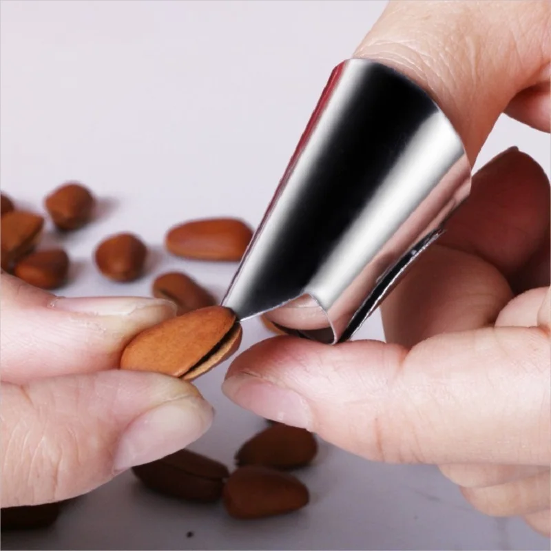 Chestnut Nut Peeling Gadget Hand Guard Iron Nail Cover Stainless Steel Kitchen Tool Protect Finger
Chestnut Nut Peeling Gadget Hand Guard Iron Nail Cover Stainless Steel Kitchen Tool Protect Finger