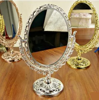 European Antique Style Bronze Rotatable Desktop Cosmetic Mirror with Flower Embossing Ellipse Makeup Mirror portable mirror
European Antique Style Bronze Rotatable Desktop Cosmetic Mirror with Flower Embossing Ellipse Makeup Mirror portable mirror