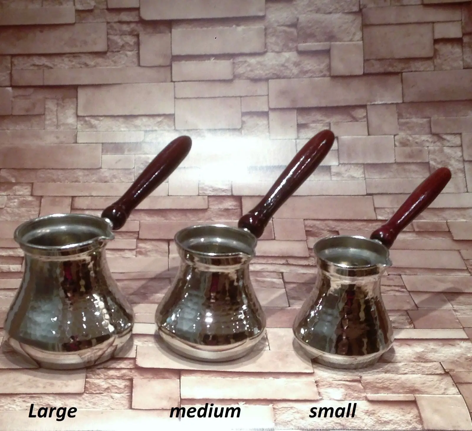 Solid Hammered Turkish Greek Arabic Coffee Pot Coffee Wooden handle,silver color
Solid Hammered Turkish Greek Arabic Coffee Pot Coffee Wooden handle,silver color