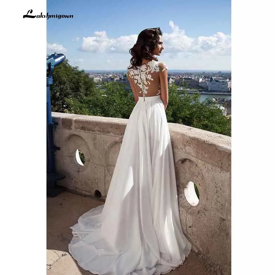 Vestido de noiva Cap Sleeves beach Wedding Dresses Chiffon Appliques Lace robe de soiree Bridal Gowns
Vestido de noiva Cap Sleeves beach Wedding Dresses Chiffon Appliques Lace robe de soiree Bridal Gowns