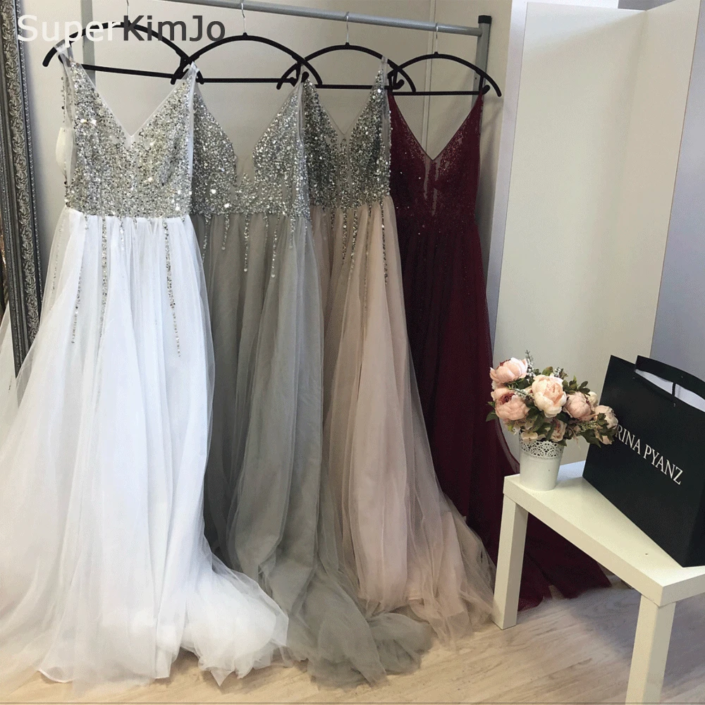 SuperKimJo Robe De Soiree Beaded Prom Dresses Long V Neck Sleeveless A Line Tulle Prom Gown Vestido De Fiesta De Boda
SuperKimJo Robe De Soiree Beaded Prom Dresses Long V Neck Sleeveless A Line Tulle Prom Gown Vestido De Fiesta De Boda