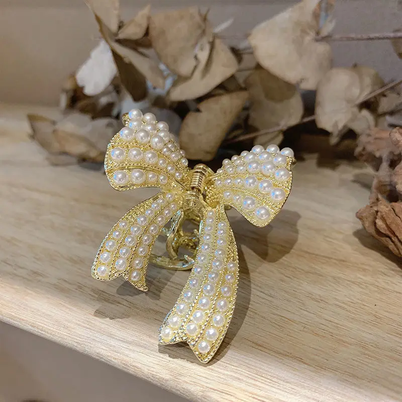 Bowknot Pearl Hair Claw Gold Hairpin Elegant Bow Hair Accessories Temperament Women Girls Wild Clips Boutique Barrettes Fashion
Bowknot Pearl Hair Claw Gold Hairpin Elegant Bow Hair Accessories Temperament Women Girls Wild Clips Boutique Barrettes Fashion