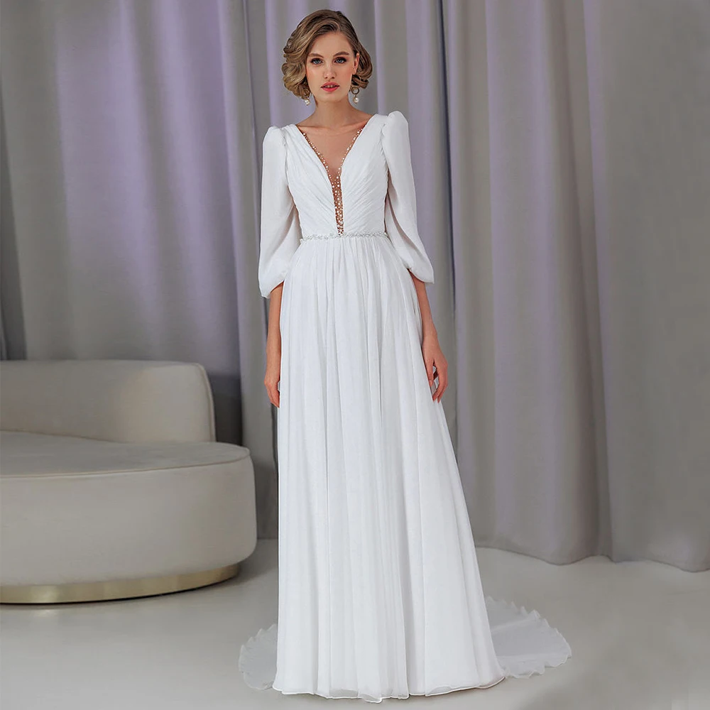 Simple A-Line Floor Length 3/4 Sleeves Wedding Dresses Sheer V-Neck Pleats Beading Sashes Bridal Dress with Crystal Court Traiin
Simple A-Line Floor Length 3/4 Sleeves Wedding Dresses Sheer V-Neck Pleats Beading Sashes Bridal Dress with Crystal Court Traiin