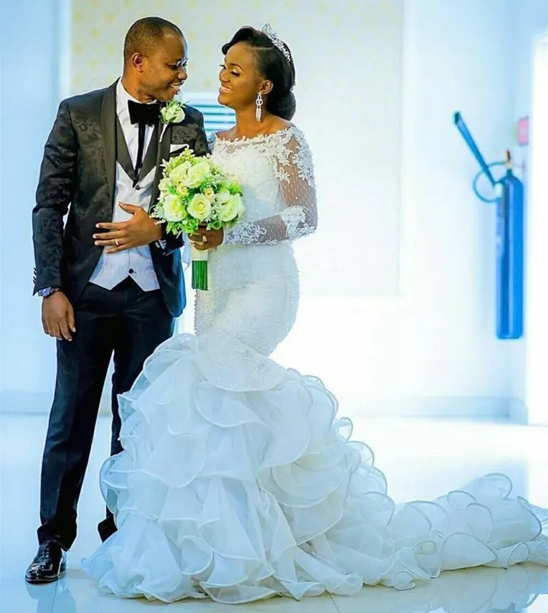 Amazing Ruffles African Lace Mermaid Wedding Dresses 2022 Scoop Neck Applique Full Sleeve Wedding Bridal Gown Robe De Mariee
Amazing Ruffles African Lace Mermaid Wedding Dresses 2022 Scoop Neck Applique Full Sleeve Wedding Bridal Gown Robe De Mariee