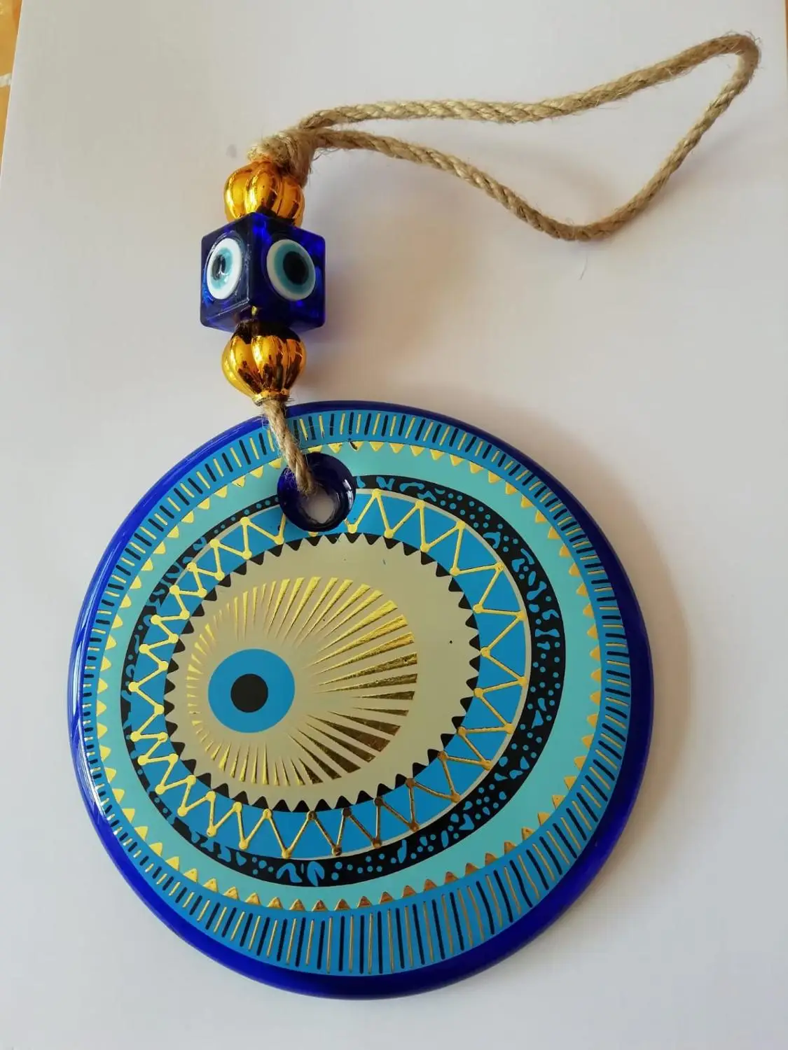 Big Size-14 cm Diameter- Golden Gilted and Colored Patterned Glass Blue Evil Eye Wall Hanging Ornament – Turkish Nazar Bead - Ho
Big Size-14 cm Diameter- Golden Gilted and Colored Patterned Glass Blue Evil Eye Wall Hanging Ornament – Turkish Nazar Bead - Ho