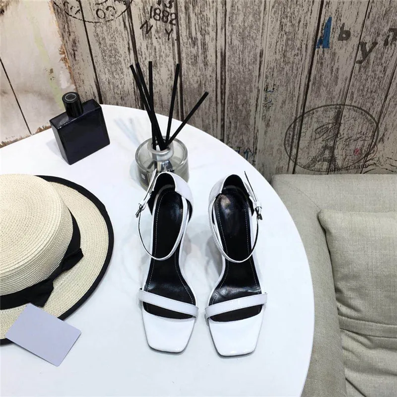 Spring/summer Latest Glossy Cow Patent Hollow Sexy Alphabet High-heeled Sandals Luxury Design Women Fashion Sandals Size 34-41
Spring/summer Latest Glossy Cow Patent Hollow Sexy Alphabet High-heeled Sandals Luxury Design Women Fashion Sandals Size 34-41