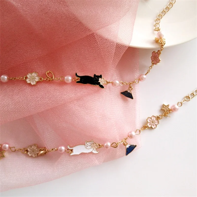 2022 New Korean Cute Cat Flower Bracelets For Women Fashion Sweet Flowers Pearl Charm Bracelet Girls Elegant Jewelry Party Gift
2022 New Korean Cute Cat Flower Bracelets For Women Fashion Sweet Flowers Pearl Charm Bracelet Girls Elegant Jewelry Party Gift
