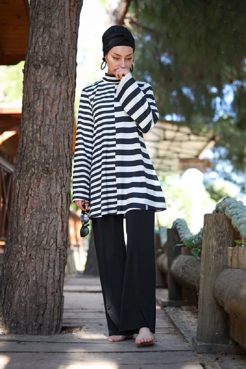 2021 black white women's hijab muslim swimwear casual baggy light does not absorb water solid durable fabric pants tunikearp bustiers are
2021 black white women's hijab muslim swimwear casual baggy light does not absorb water solid durable fabric pants tunikearp bustiers are