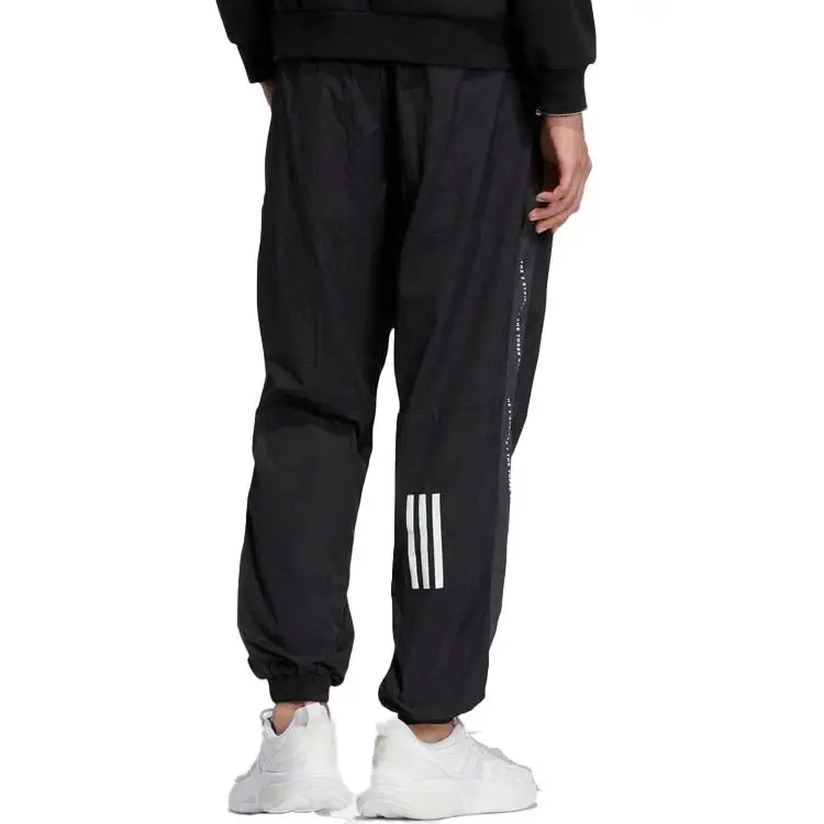 Повседневные брюки Adidas в полоску с буквенным принтом низ унисекс черный IA9422