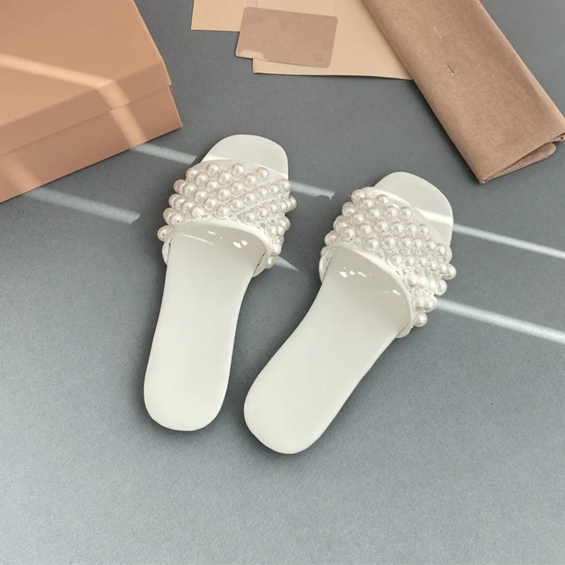 

2022 Women Fahsion Flat Slippers Summer Princess Girl Wind Wisps Empty Hand-sewn Pearls Slippers Casual Miss Bech High Heels