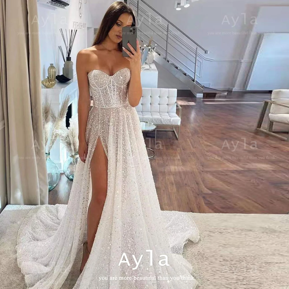 

Женское блестящее платье It's yiiya, белое свадебное платье без бретелек с разрезом сбоку на лето 2019