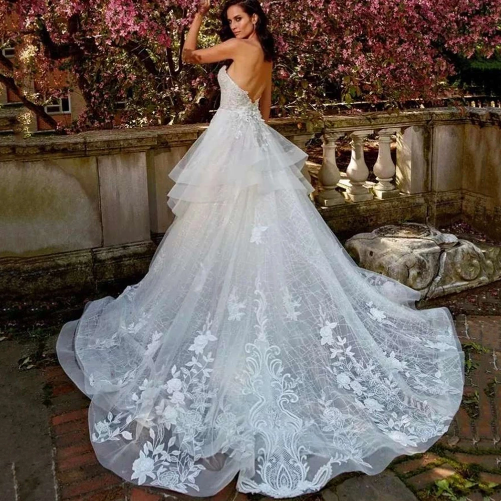 

Sweetheart Wedding Dress Sleeveless Lace Appliques Sexy Backless Bridal Gown Tulle A-Line Sweep Train Pleat Robe De Mariée