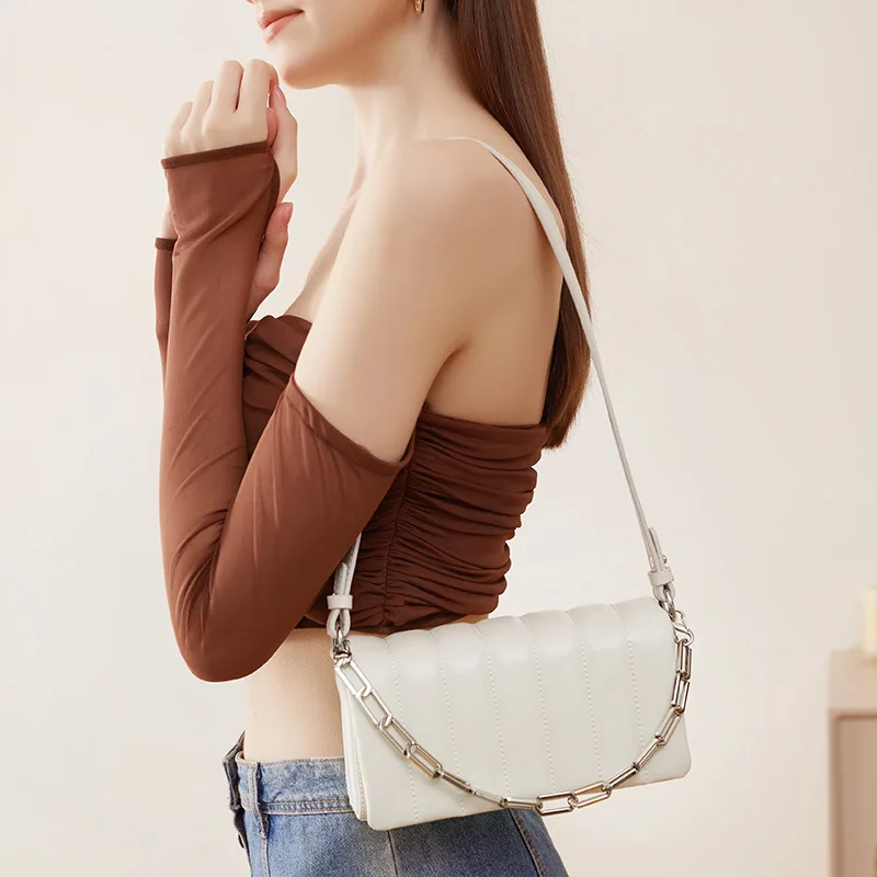 

Leather Xiaoxiang chain underarm bag female 2023 new spring/summer cowhide French high-grade feeling niche single shoulder cross