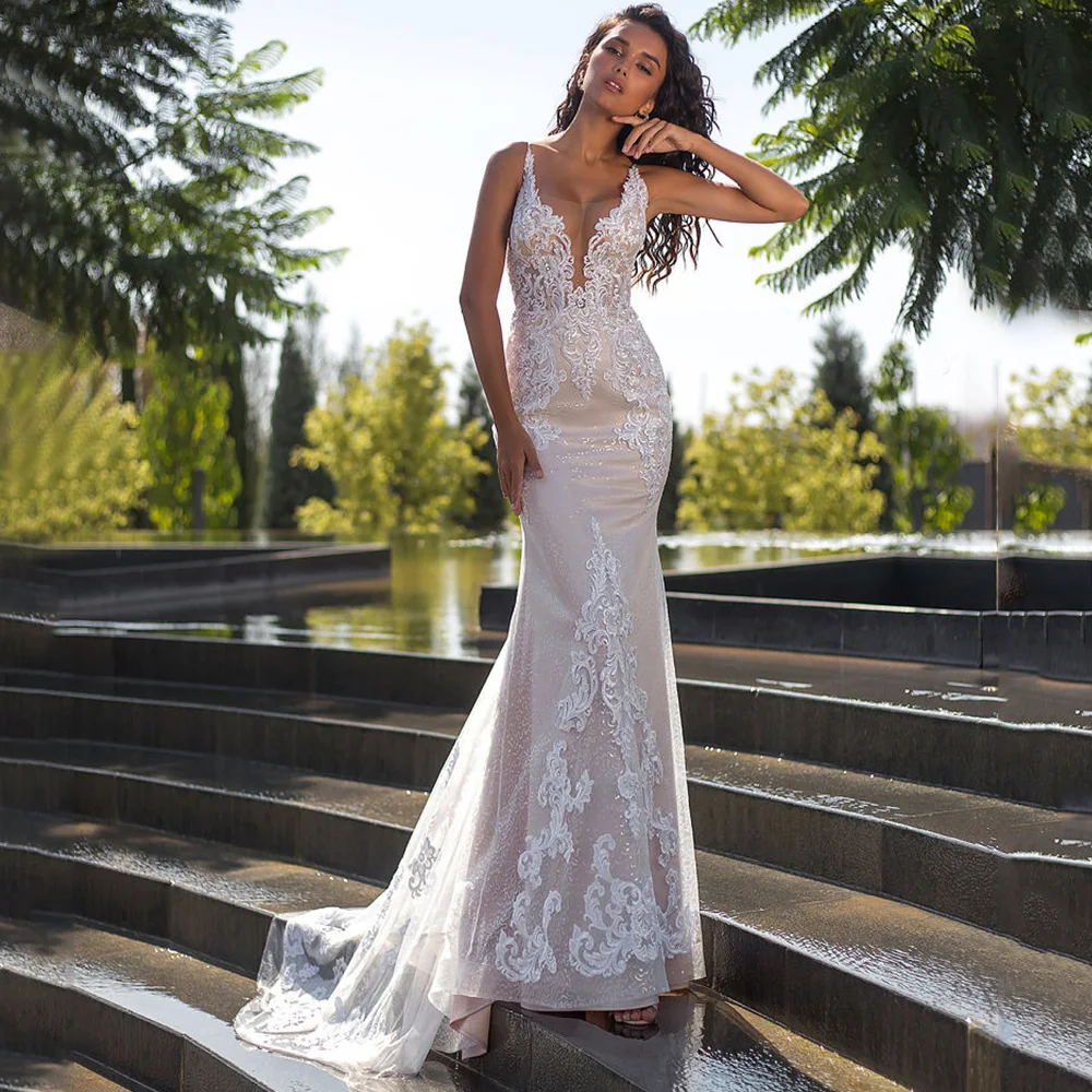 

Exquisite Sleeveless Applique Mermaid Wedding Dress Floor Length Tulle Sexy Open Back Spaghetti Straps Bride Sweep Train Gowns