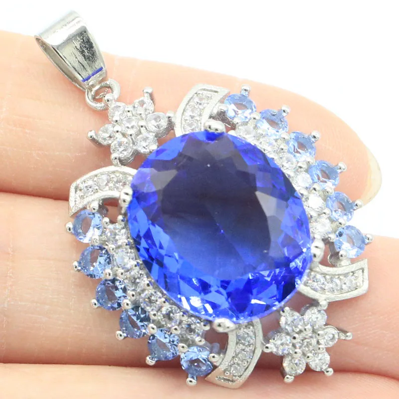 

Кулон женский круглый из серебра 925 пробы с фианитом, 42x26 мм