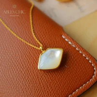 sterling silver mother of pearl lip pendant gold tone double sided white shell necklace l1s2n31011