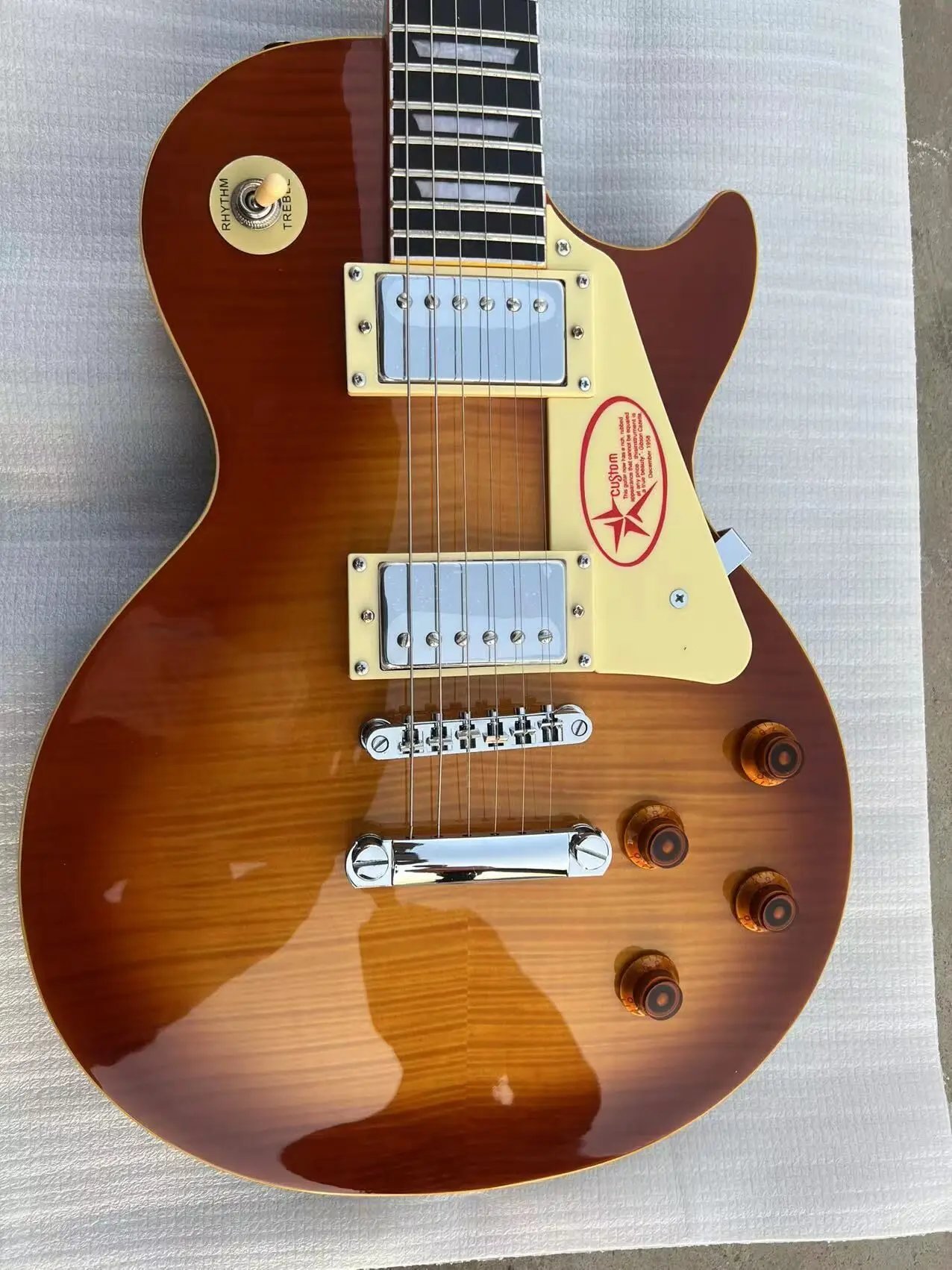 

1959 Flame Maple Top Butterscotch Sunburst Electric guitar Custom Pickguard, Yellow Body Binding, Tuilp Tuners, Chrome Hardware