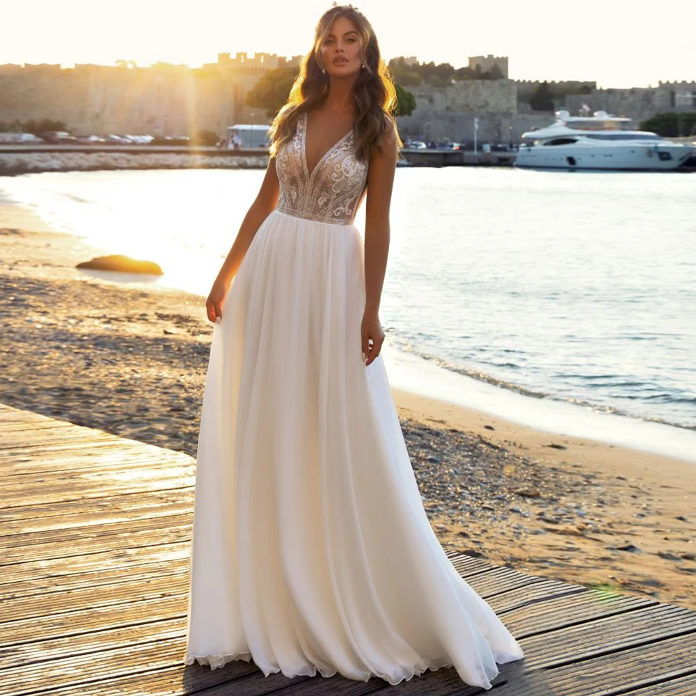 

Classic Sleeveless Chiffon Beach Wedding Dress with Sweep Train 2023 Brides Appliques Lace V-Neck Bridal Gowns Vestido De Novia